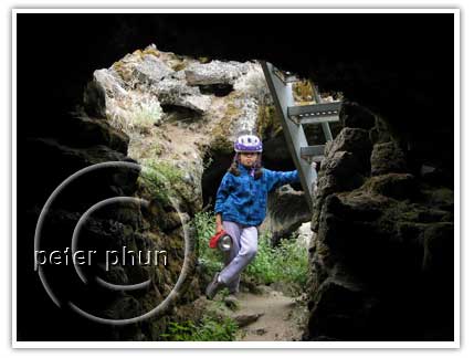 Julie posing inside a cave without being asked to