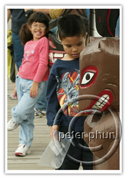 In Ketchiken, Julie mocks her brother as they stroll downtown
