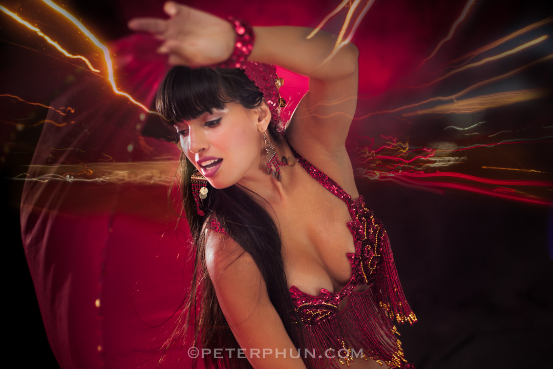 Melinda in red belly dancing outfit